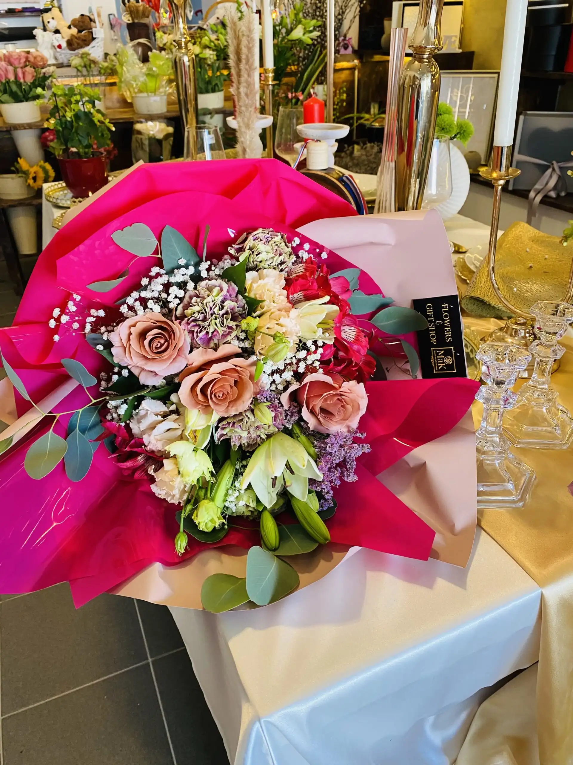 Hand-tied bouquet with carefully arranged flowers.