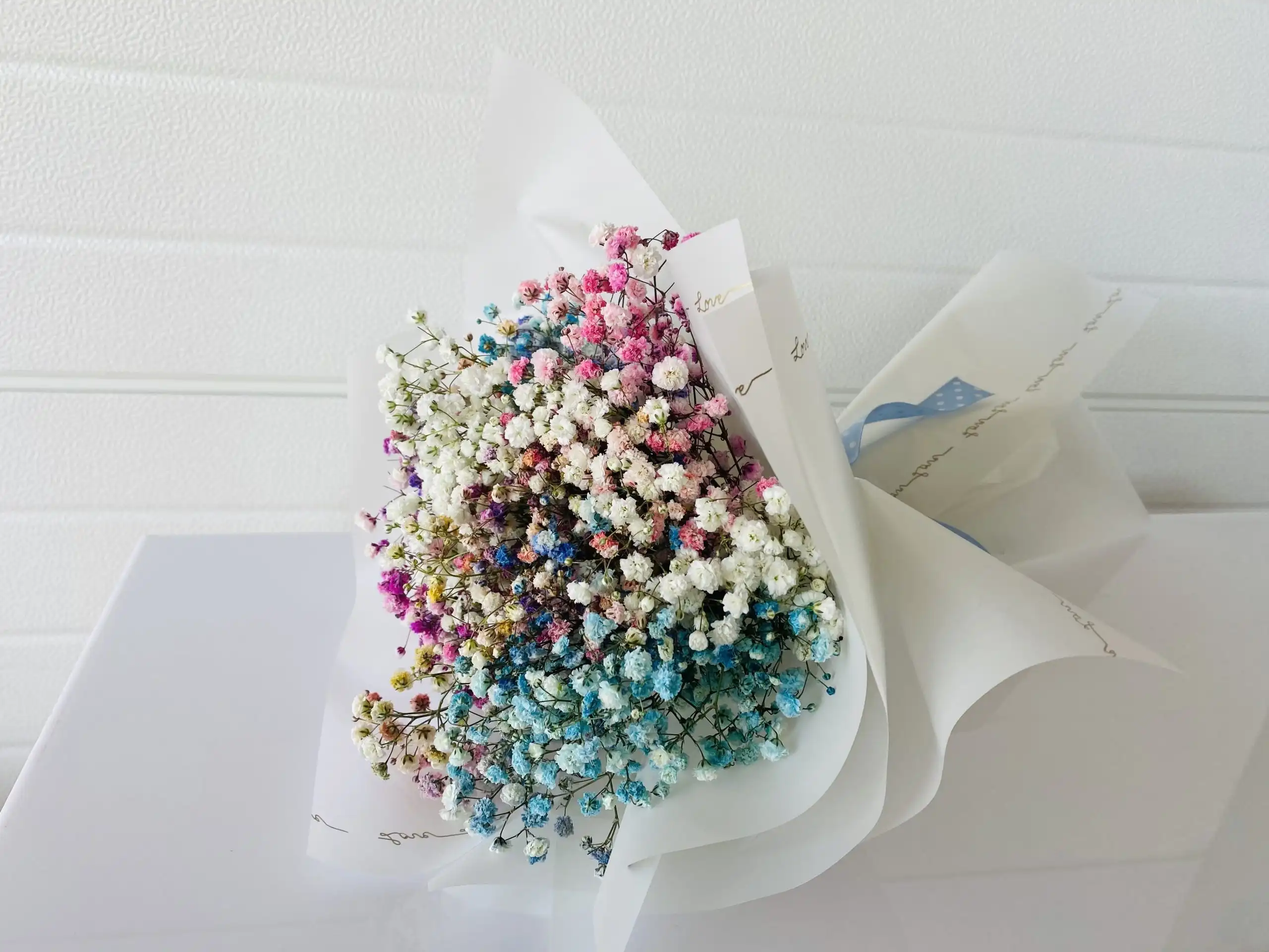 Hand-tied bouquet with carefully arranged flowers.