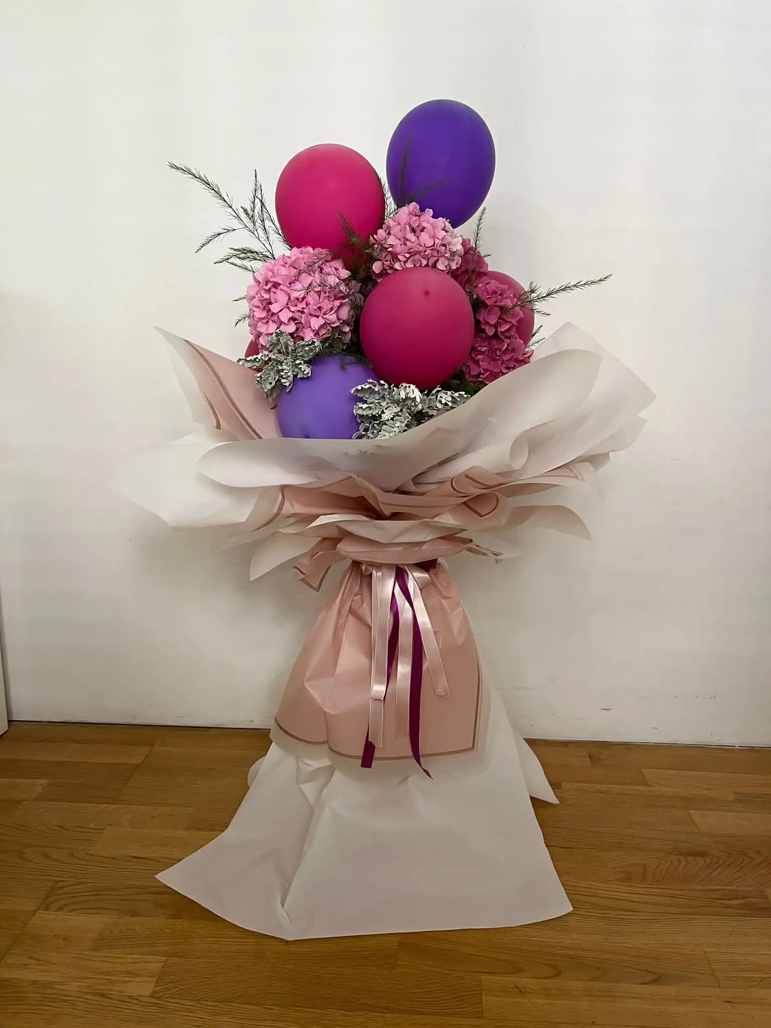 Hand-tied bouquet with carefully arranged flowers.