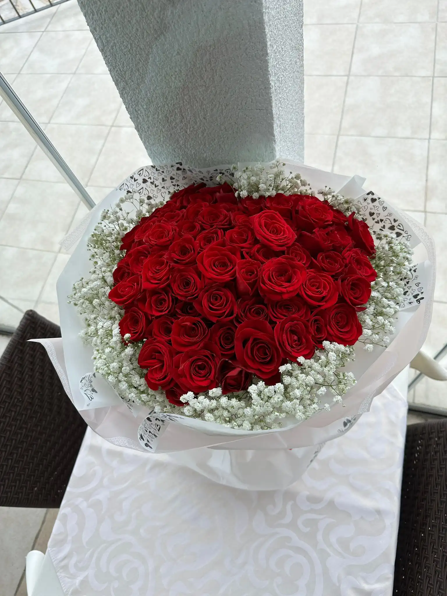 Hand-tied bouquet with carefully arranged flowers.