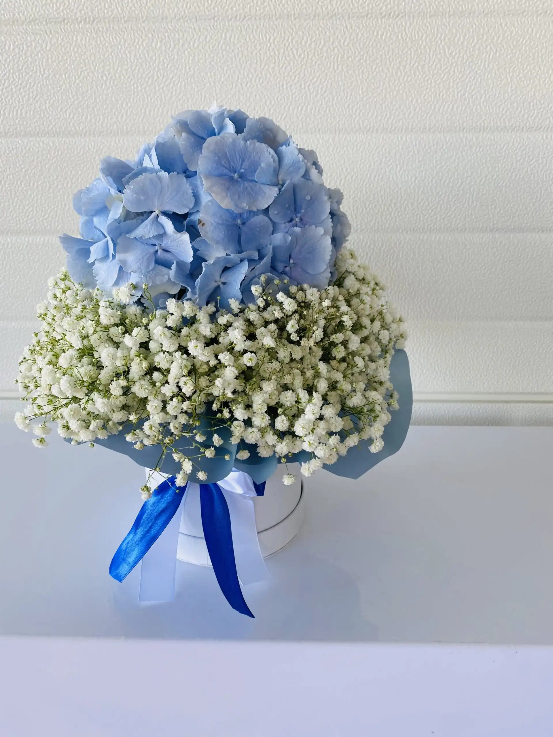 Floral arrangement in a flower box.