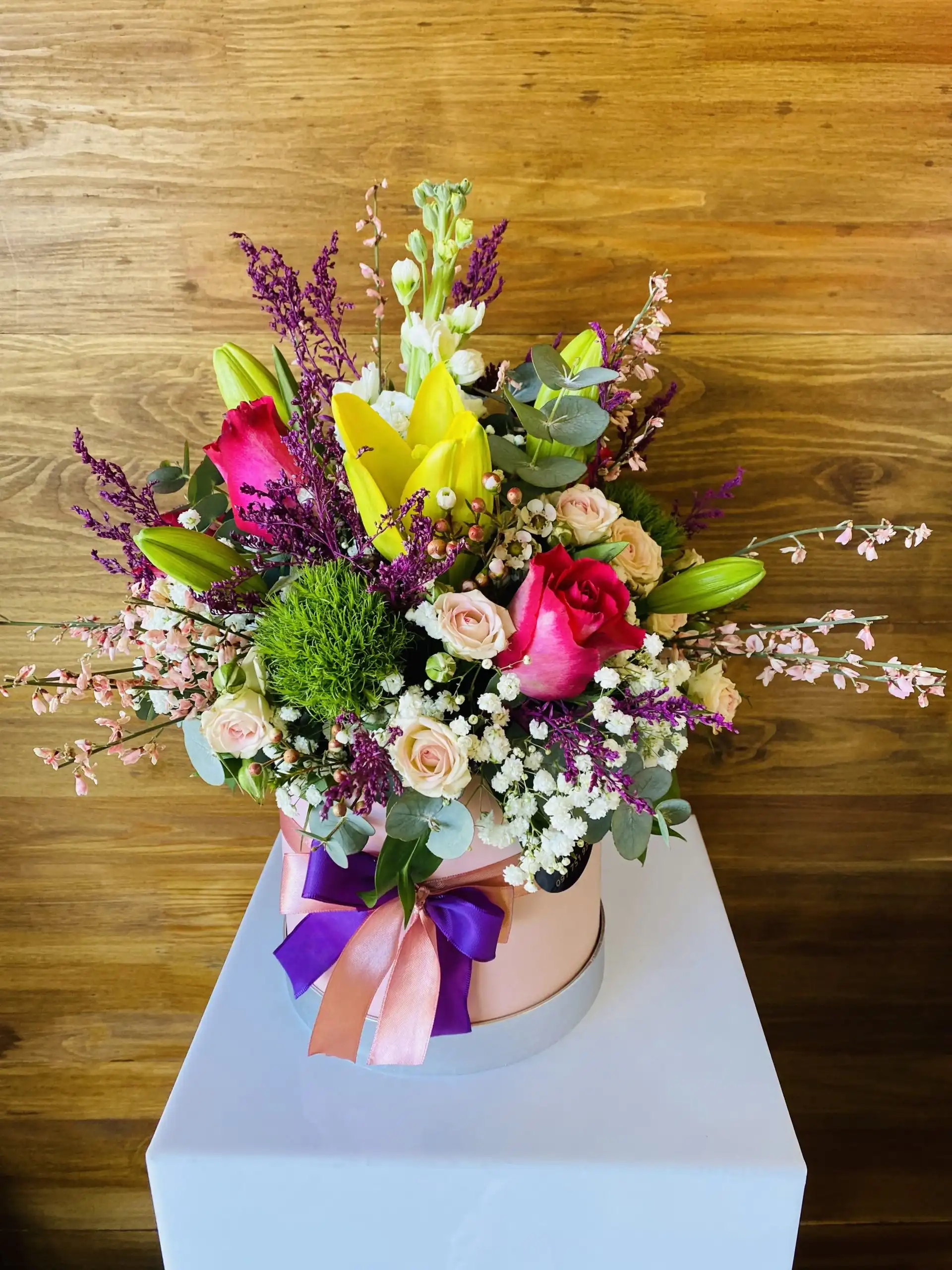 Floral arrangement in a flower box.