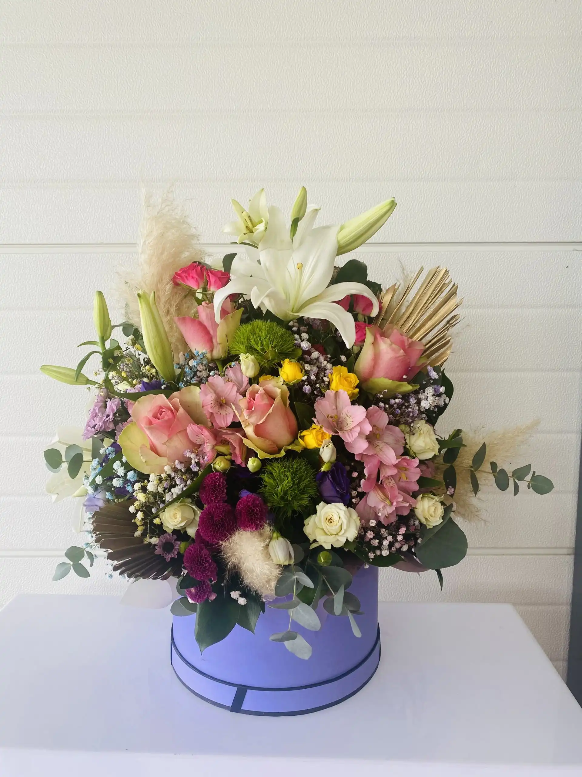 Floral arrangement in a flower box.