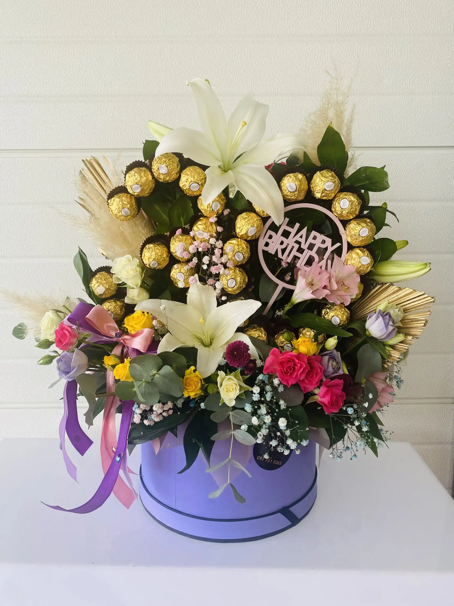 Floral arrangement in a flower box.