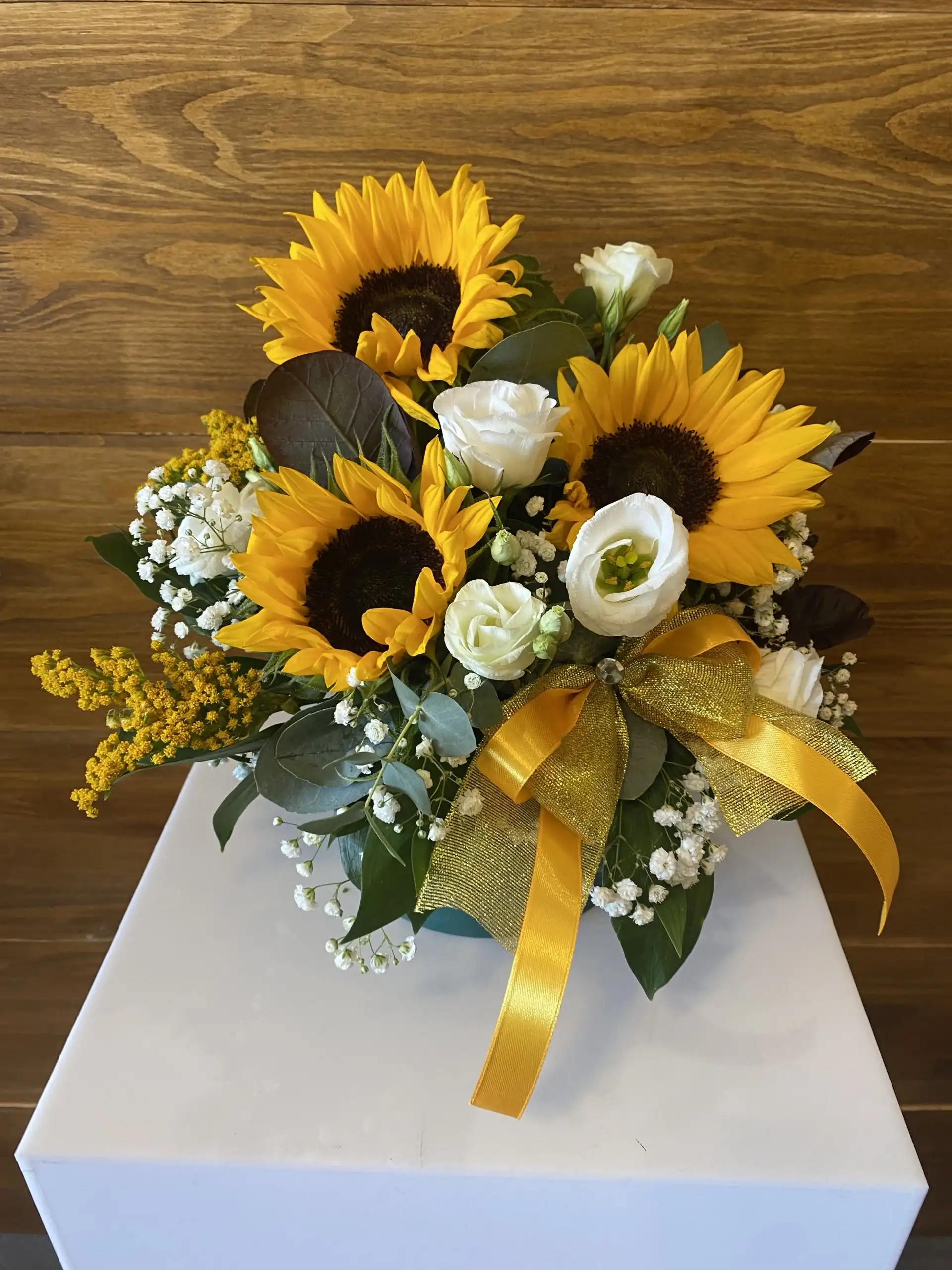 Floral arrangement in a flower box.