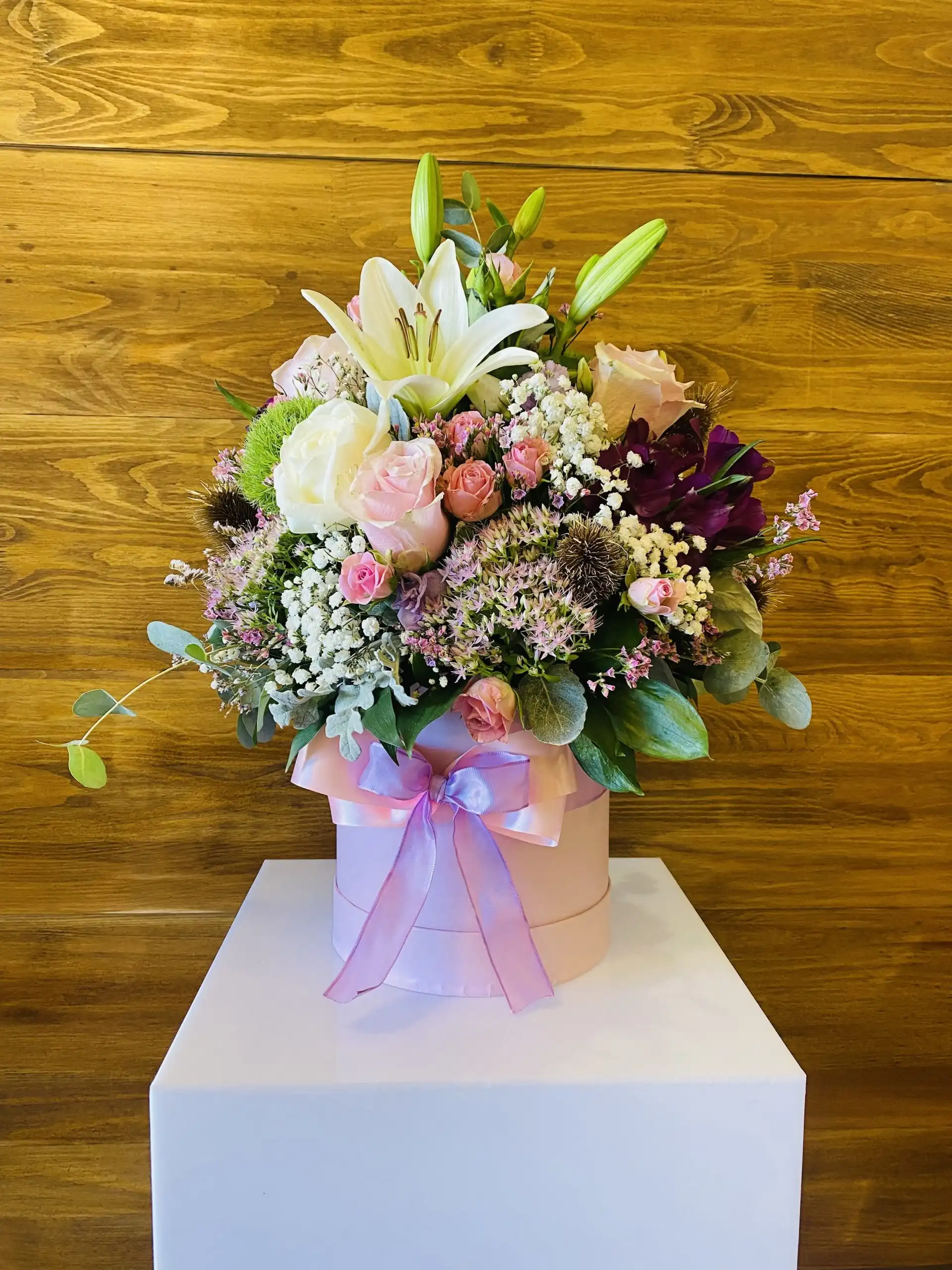 Floral arrangement in a flower box.