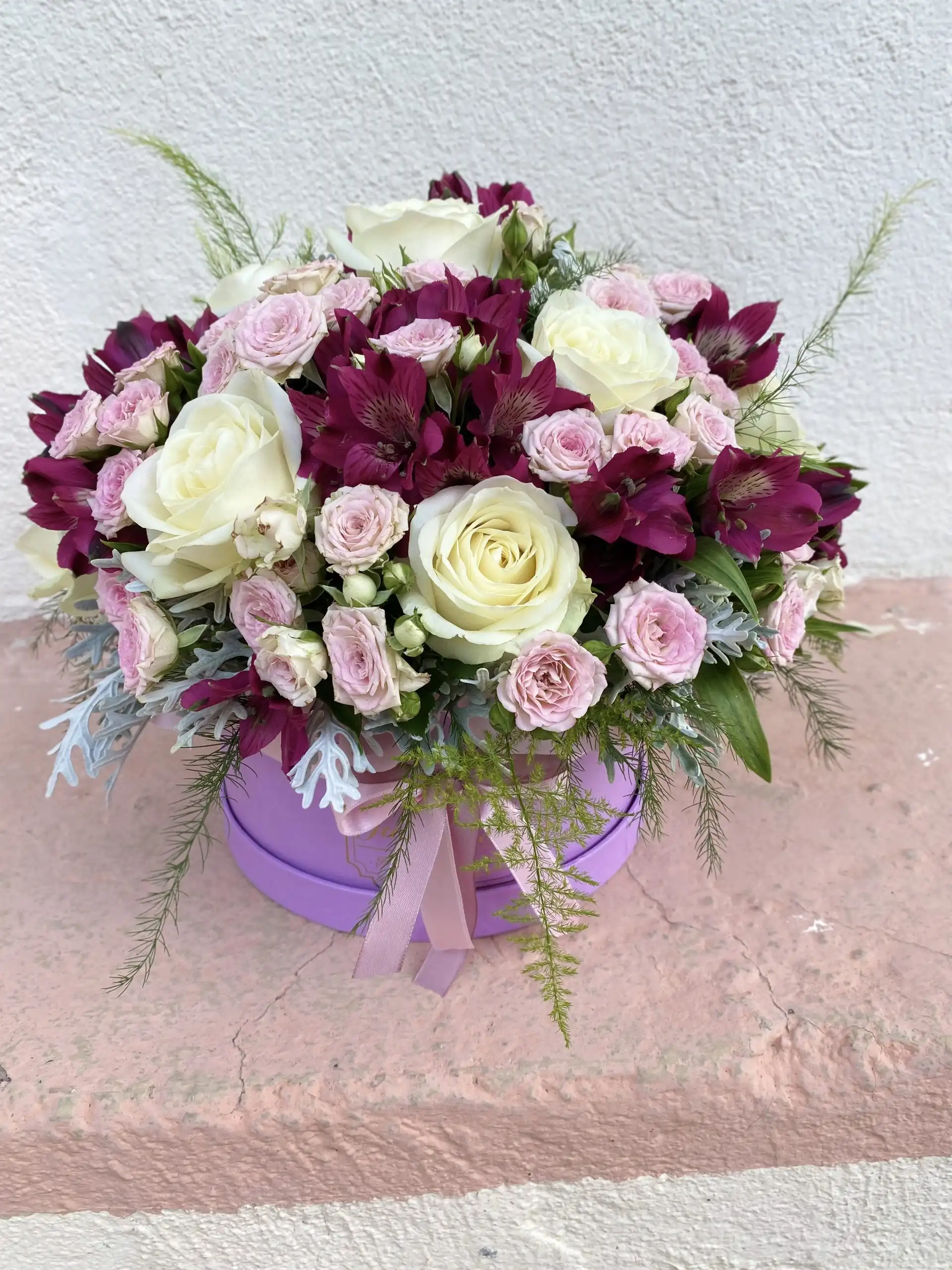 Floral arrangement in a flower box.